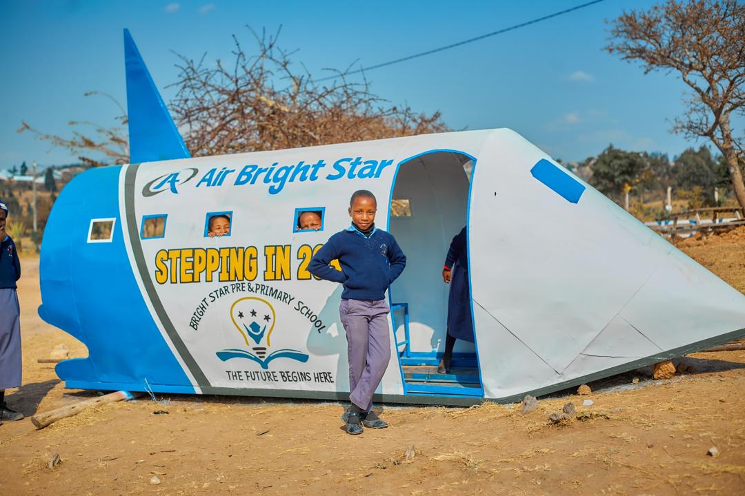 Student with Air Bright Star Display